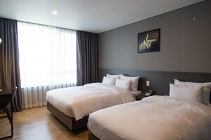 Superior Twin Room | Down comforters, in-room safe, desk, blackout drapes