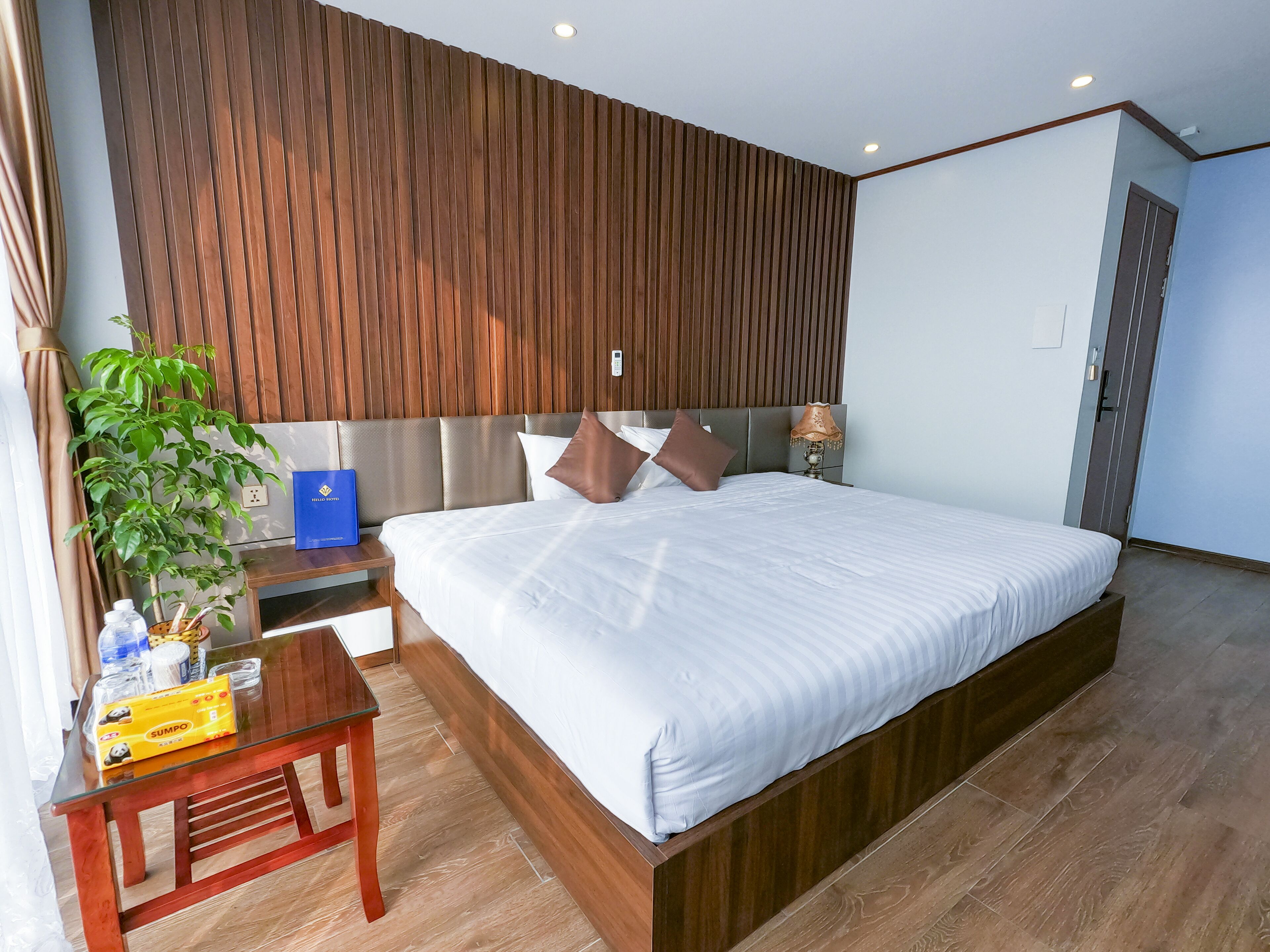 deluxe room | minibar, desk, laptop workspace, blackout curtains
