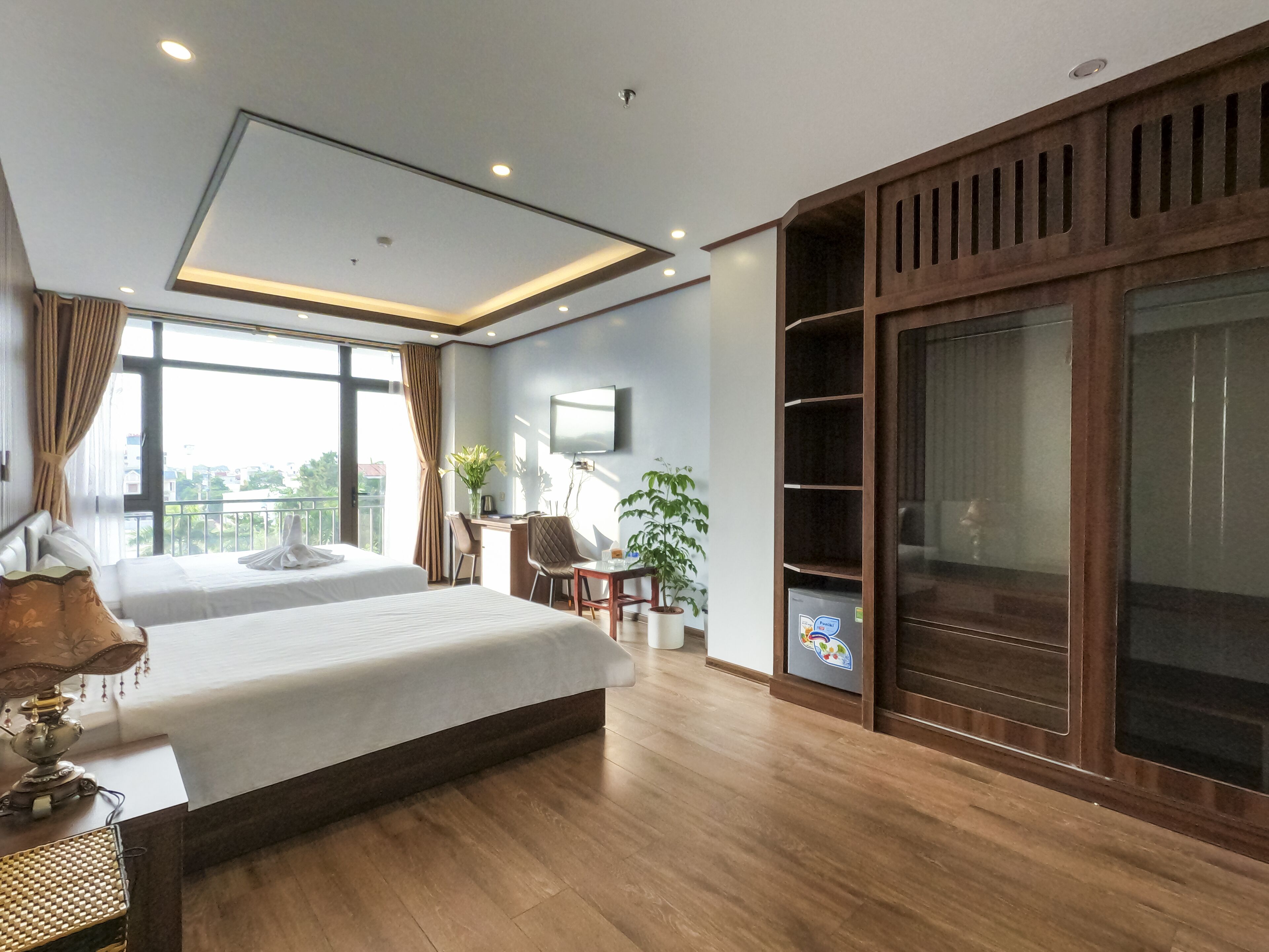 minibar, desk, laptop workspace, blackout curtains