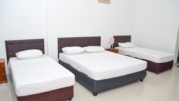 Coffres-forts dans les chambres, fer et planche Ă repasser