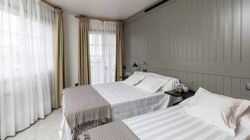 Escritorio, cunas gratuitas, camas extra y wifi gratis