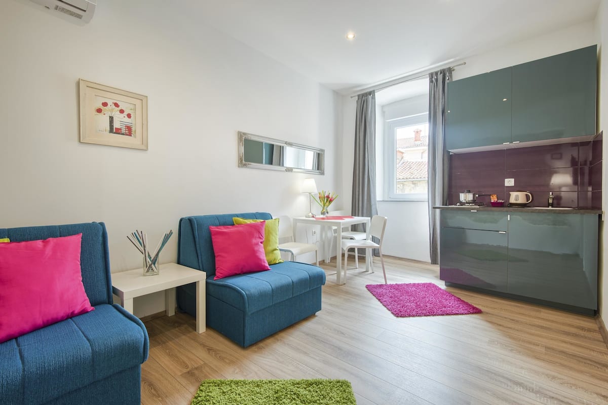 Apartment, 1 Bedroom | Living area | Flat-screen TV