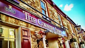 The Cornish Arms, a pub with a stone facade and traditional architecture. - The Cornish Arms (Tavistock)