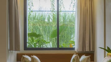 Penh House One-Bedroom Suite | Minibar, in-room safe, desk, laptop workspace