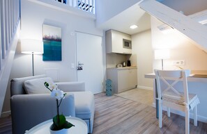 Exclusive Duplex, Kitchen (Studio 8) | Living area | Flat-screen TV