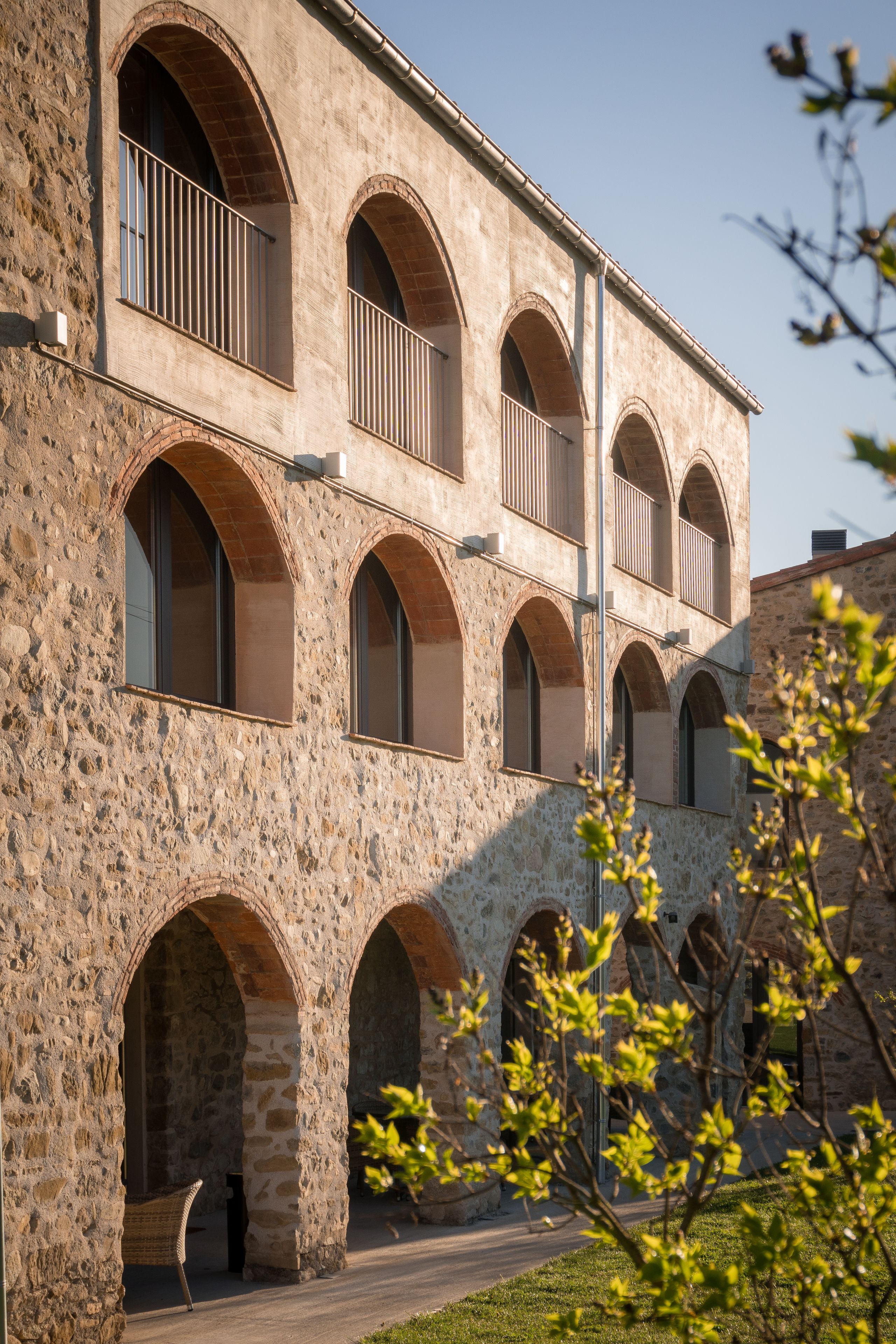 A building with multiple arched windows and balconies.