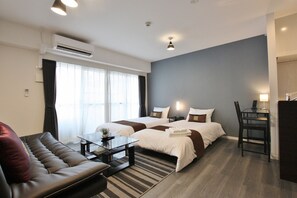 Blackout curtains, iron/ironing board, free WiFi, bed sheets