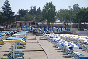 Private beach, sun-loungers, beach umbrellas, beach bar