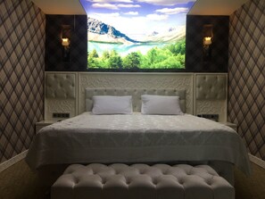 Habitación exclusiva | Minibar, caja de seguridad en la habitación y escritorio 