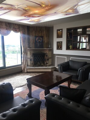 Camera Exclusive | Area soggiorno | TV LED