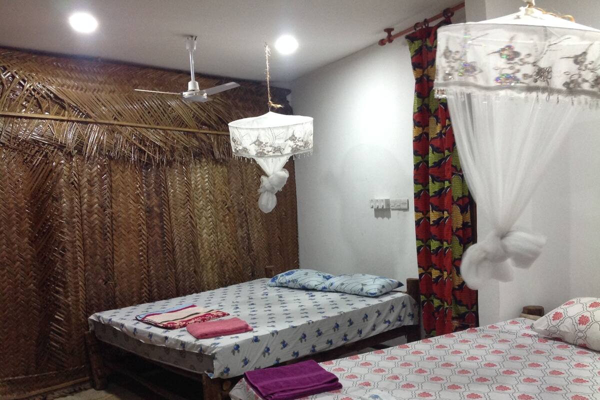 Economy Quadruple Room, 1 Bedroom, Balcony, City View | Desk, iron/ironing board, free WiFi, individually decorated