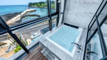 Designer toiletries, hair dryer, bathrobes, slippers