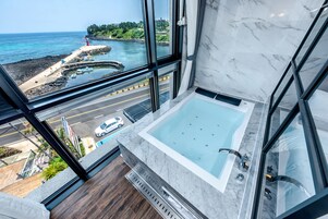 Designer toiletries, hair dryer, bathrobes, slippers