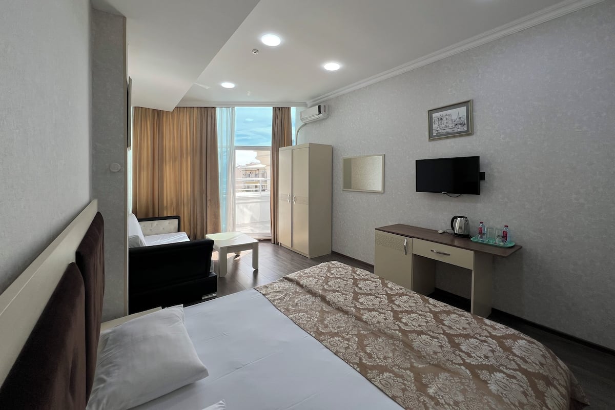 Standard Triple Room | 1 bedroom, minibar, in-room safe, desk