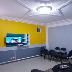 Comfort Apartment, 1 Bedroom, City View | Living room | Plasma TV - Les Residences Rima 2 (Abidjan)