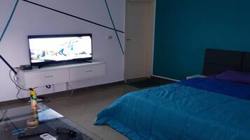 Suíte estúdio conforto | 1 quarto, escrivaninha, ferros/tábuas de passar roupa, Wi-Fi de cortesia