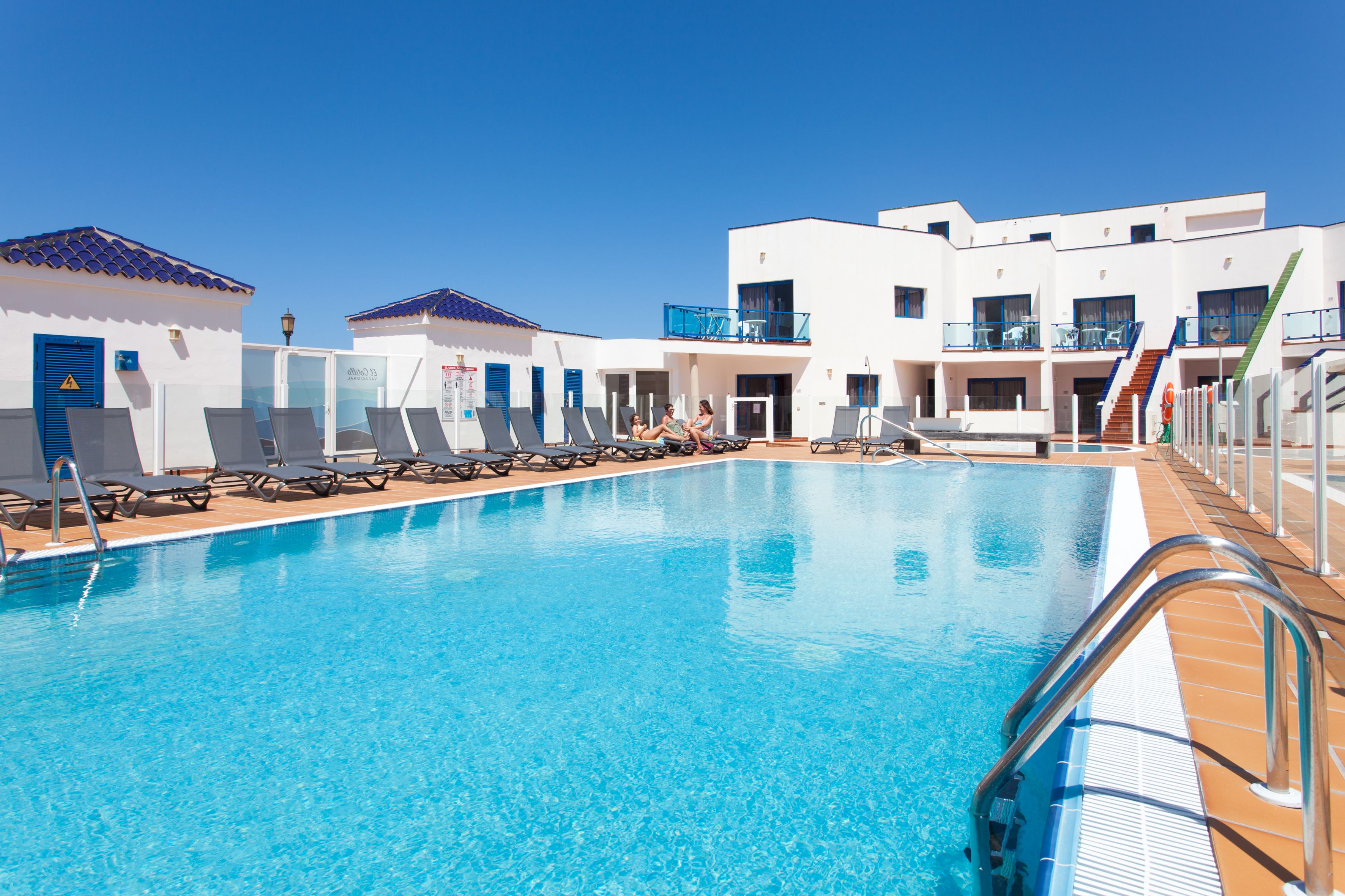 2 outdoor pools, open 10 AM to 6 PM, pool umbrellas, pool loungers