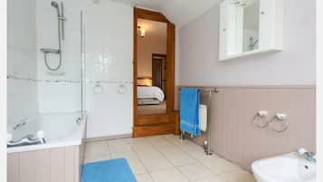 Cottage, 2 Bedrooms, Garden View | Bathroom | Separate tub and shower, free toiletries, hair dryer, slippers