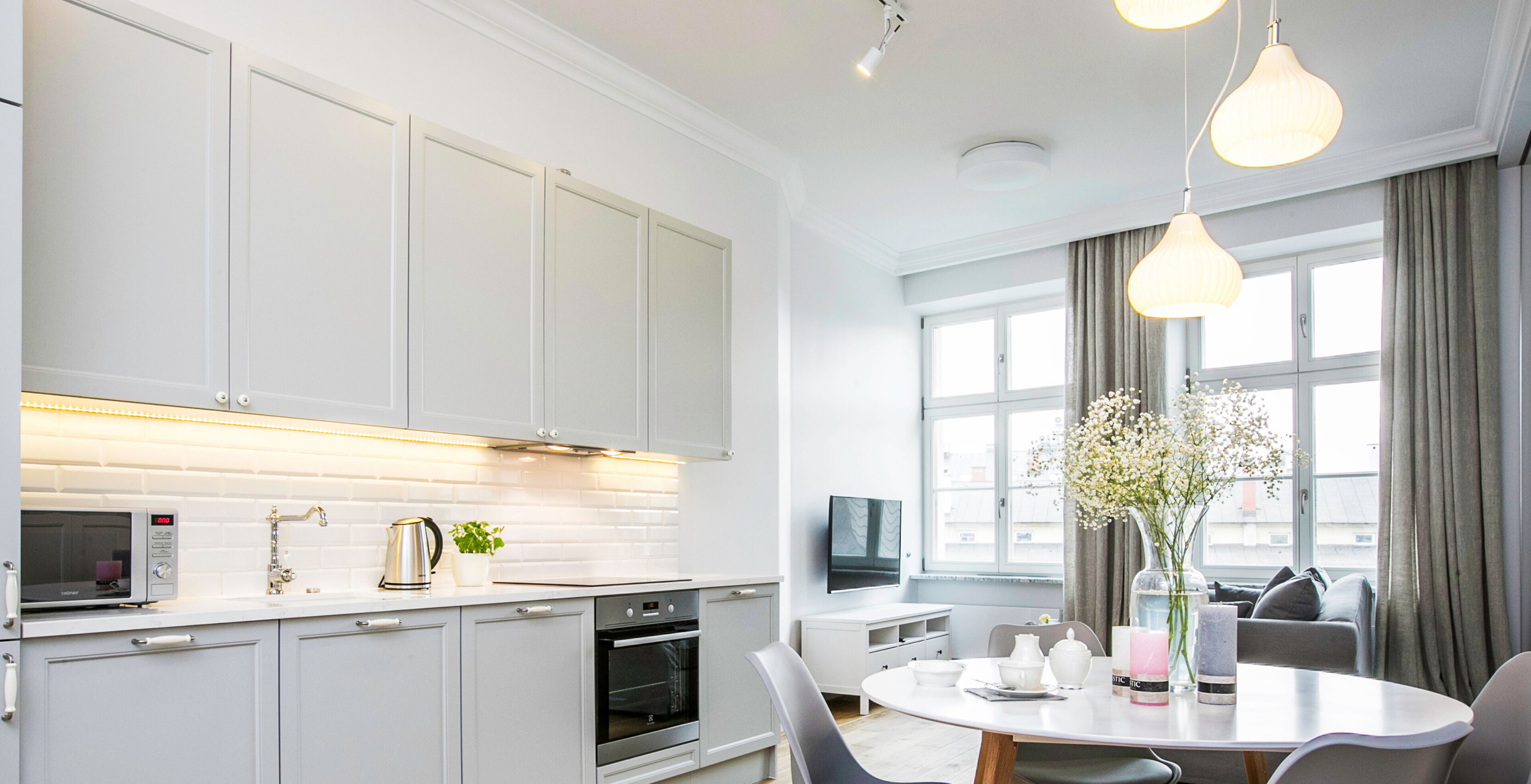 luxury apartment, 1 bedroom, kitchenette, city view | living area | 40-inch tv with cable channels