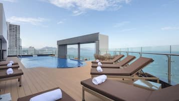 Outdoor pool, open 6:00 AM to 10:00 PM, sun loungers