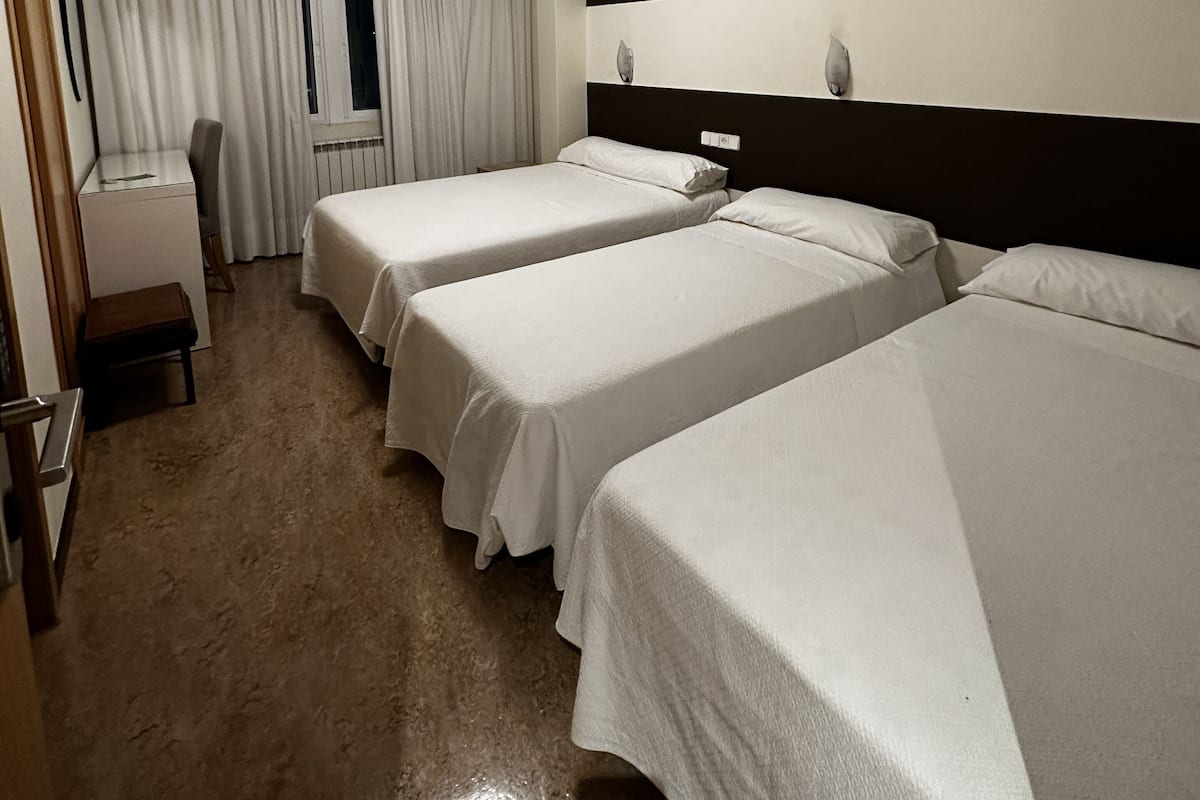 Standard Quadruple Room | 1 bedroom, desk, free WiFi, bed sheets
