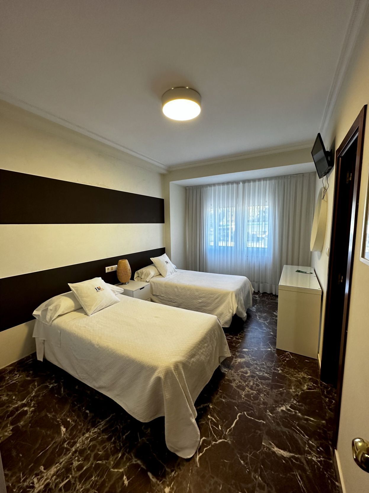 Desk, free WiFi, bed sheets
