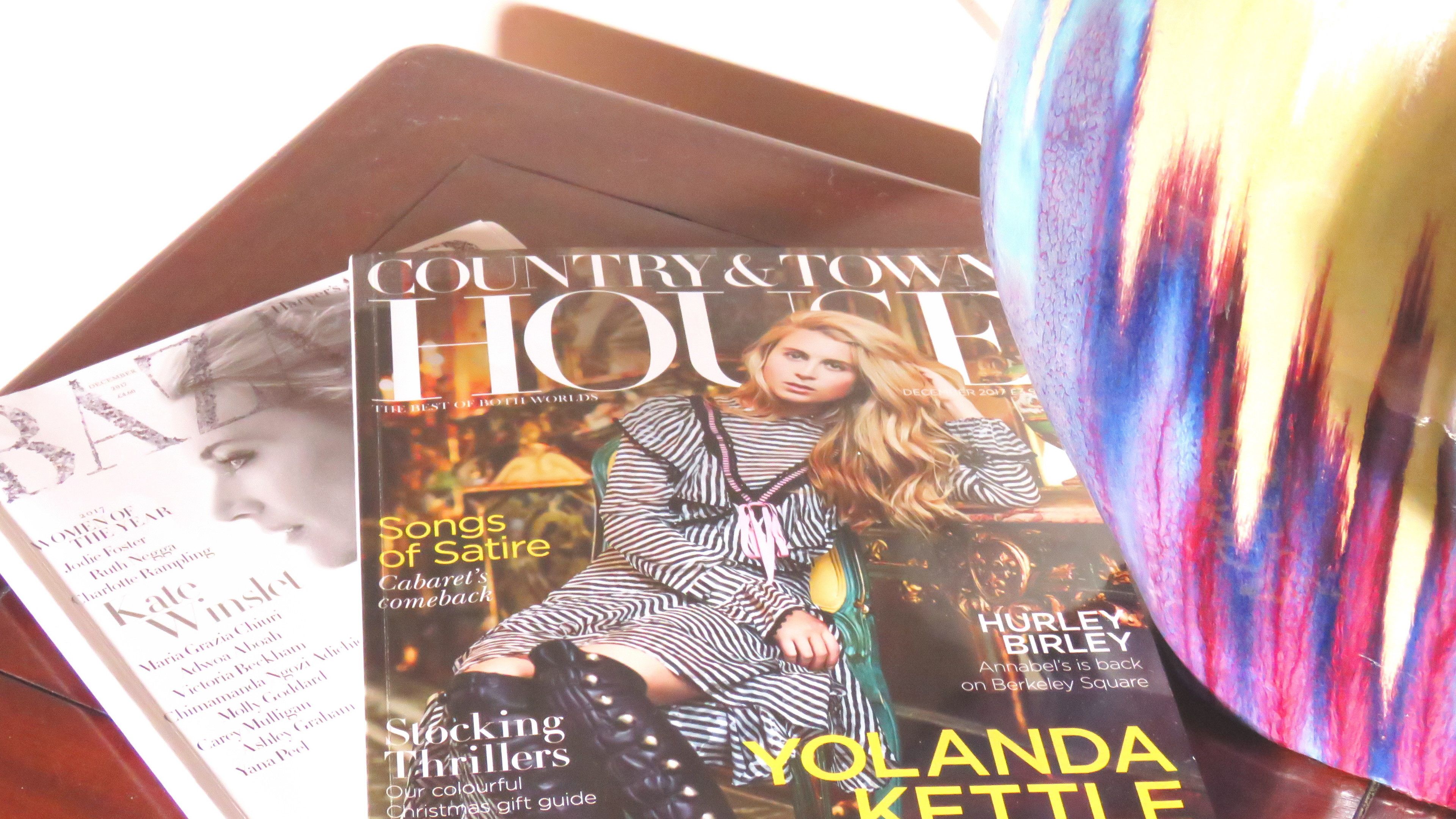 A magazine cover with the title "COUNTRY & TOWN HOUSE" and the name "YOLANDA KETTLE" prominently displayed.