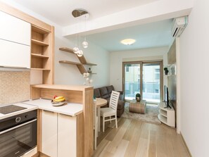 Lägenhet Deluxe - 2 sovrum | Vardagsrum | LCD-tv