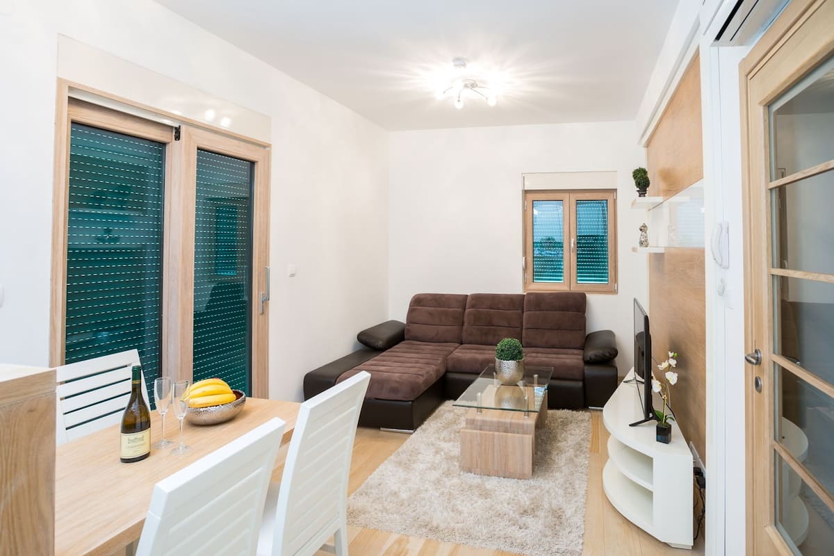 Deluxe Apartment, 2 Bedrooms, Terrace | Living room | LCD TV