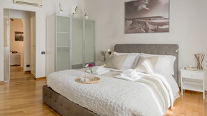 Departamento | 1 habitación, tabla de planchar con plancha, wifi gratis y ropa de cama 