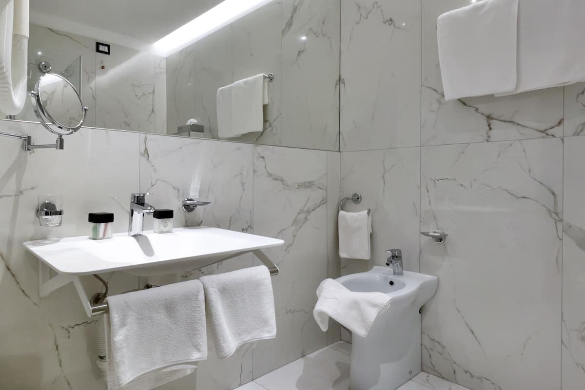 comfort room | bathroom | shower, rainfall showerhead, designer toiletries, hair dryer
