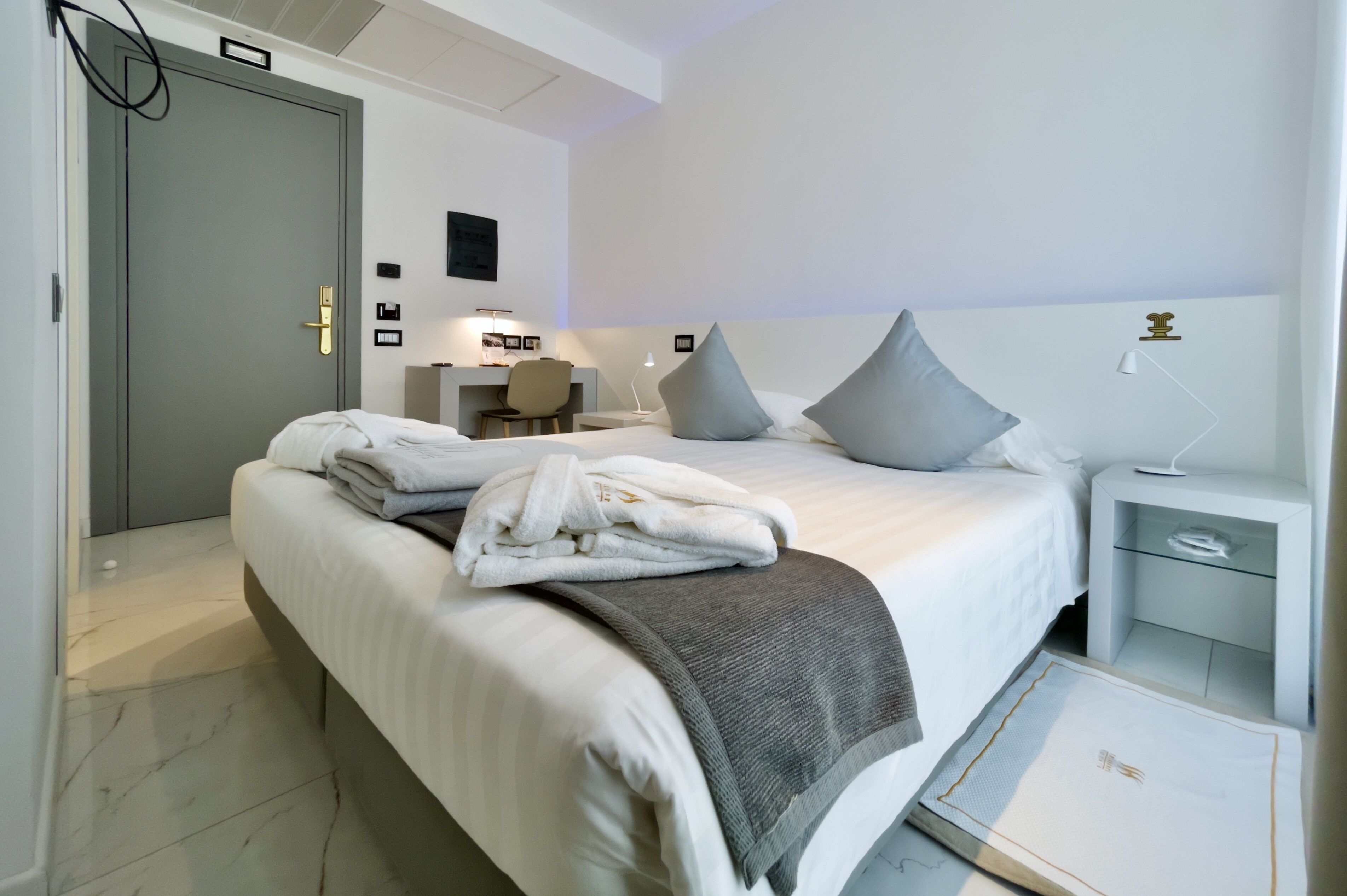 Foto - Monaco Suites Hotel