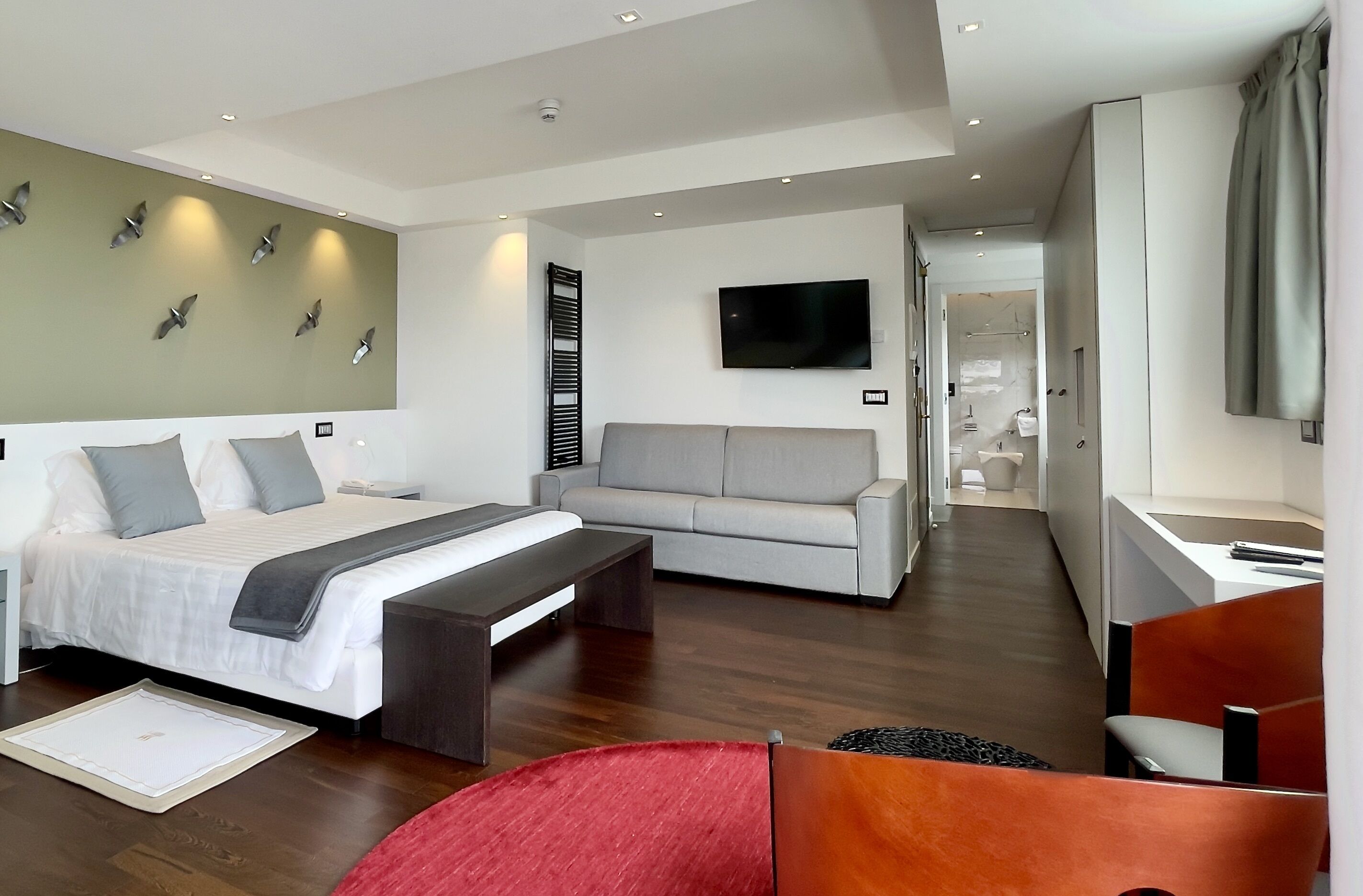 Foto - Monaco Suites Hotel