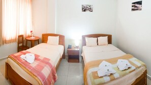Triple Room, Multiple Beds | Minibar, in-room safe, desk, iron/ironing board - Hotel Jose Antonios Inn (Tambopata)