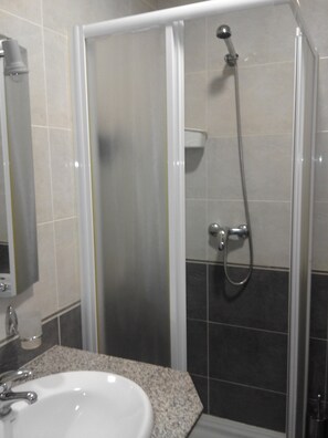 Shower, rainfall showerhead, towels