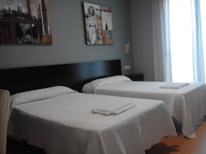 Double or Twin Room | Desk, rollaway beds, bed sheets