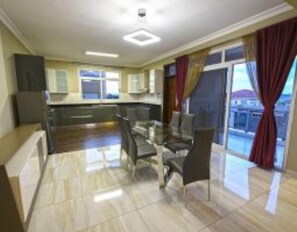 Fridge, microwave, oven, stovetop - Moyo Close Apartments (Kampala)