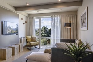 Superior Apartment | Living room | 40-inch LED TV with cable channels, TV
