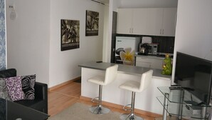 Classic Apartment, 2 Bedrooms | Living area | Flat-screen TV - Las Americas Troya (Arona)