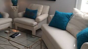 Bungalow, Poolside | Living room | Flat-screen TV