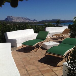 Deluxe Villa, 4 Bedrooms, Pool Access, Beachfront | Terrace/patio
