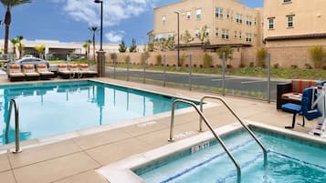 Outdoor pool, open 10:00 AM to 10:00 PM, sun loungers