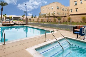 Outdoor pool, open 10:00 AM to 10:00 PM, sun loungers