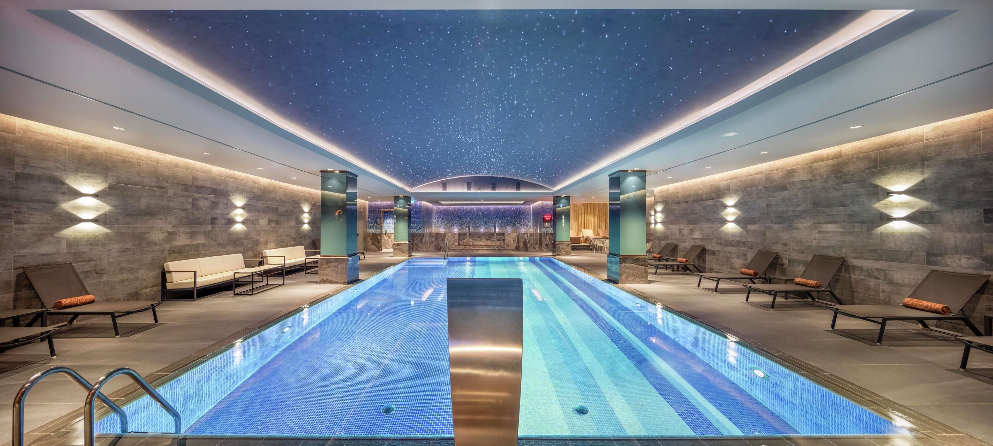 Indoor pool, open 7:00 AM to 10:00 PM, sun loungers