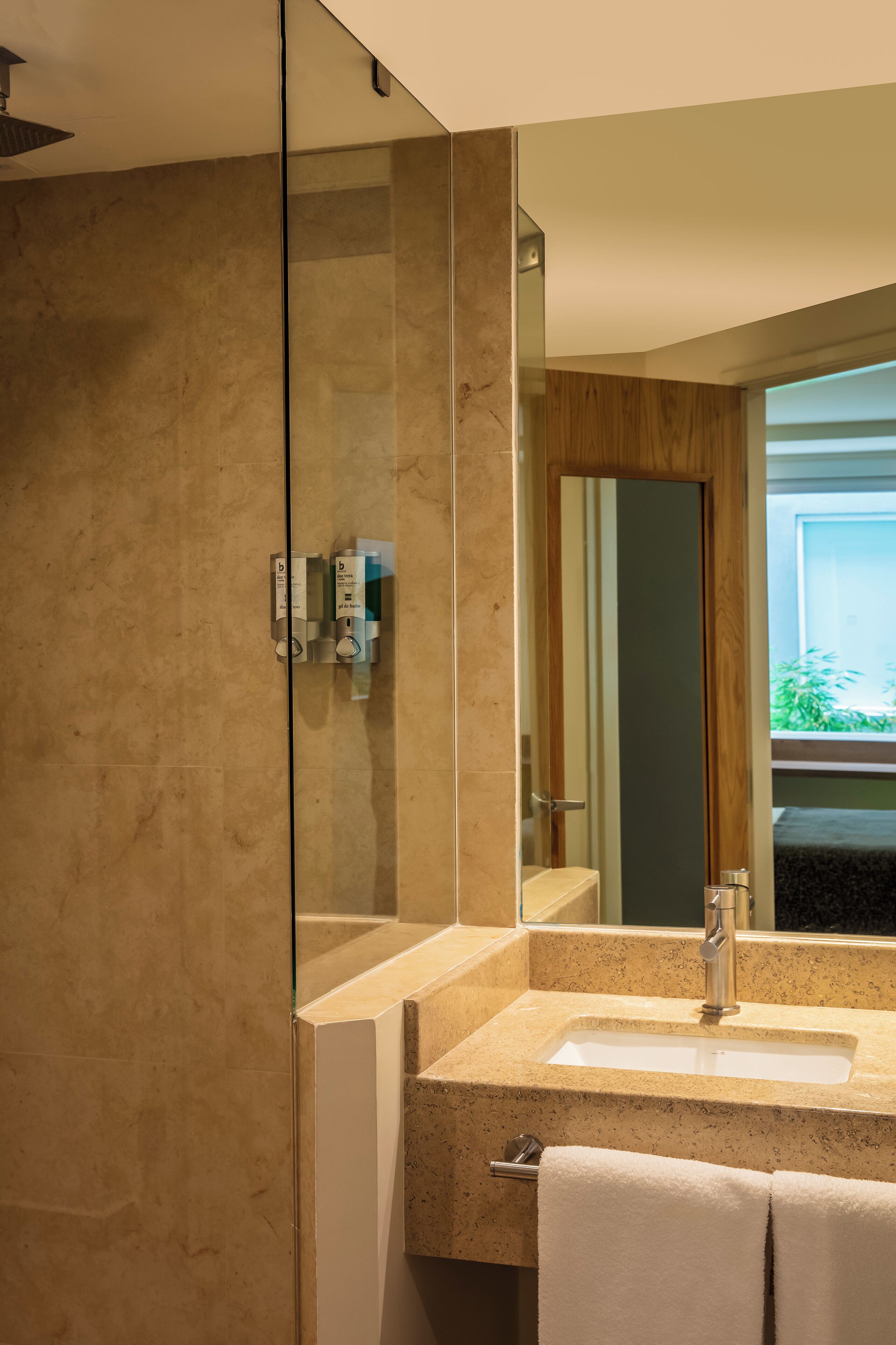 shower, rainfall showerhead, eco-friendly toiletries, towels