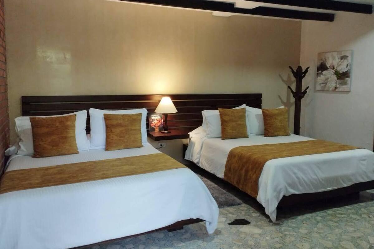 Standard Quadruple Room, 2 Double Beds, Garden View, Garden Area | Iron/ironing board (on request)