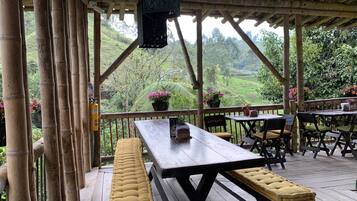 Breakfast, lunch served; local and international cuisine, garden views