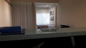 Appartement | Coin cuisine privé | Réfrigérateur, plaque de cuisson