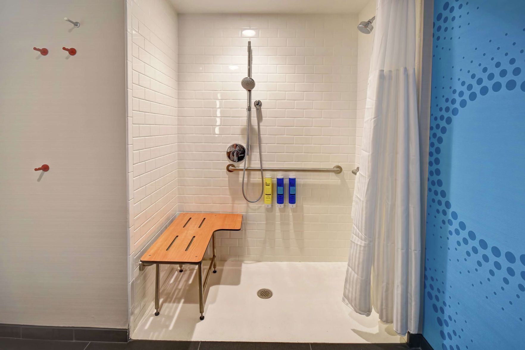 Bathroom | Shower, designer toiletries, hair dryer, towels