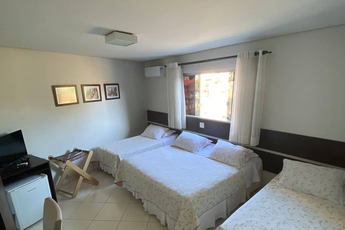 Standard Triple Room | Minibar, desk, blackout curtains, iron/ironing board